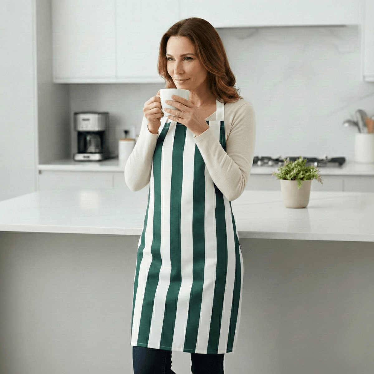 Green and White Stripe Water Repeelent Apron Woman Stood in Kitchen